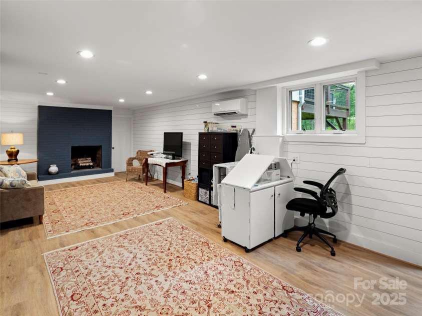 19 Pheasant Drive, Asheville, NC 28803.  MLS# CAR4284659, YatesRealty ID 31086. Family space in basement
