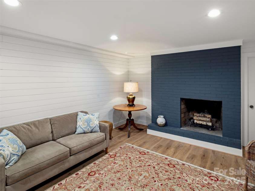 19 Pheasant Drive, Asheville, NC 28803.  MLS# CAR4284659, YatesRealty ID 31086. Family space in basement