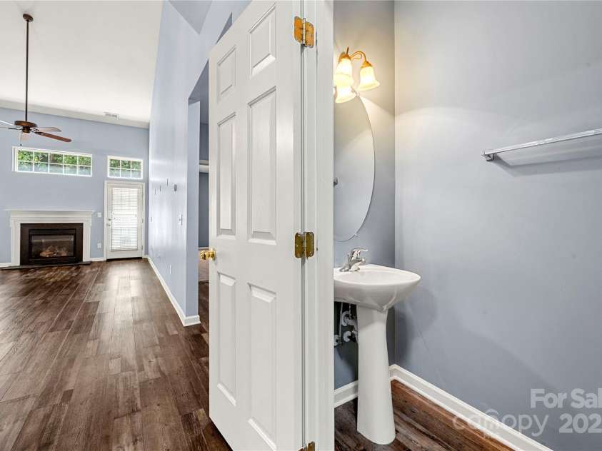 1883 Lookout Lane, Gastonia, NC 28054.  MLS# CAR4286536, YatesRealty ID 31087. Great room with Gas log Fireplace