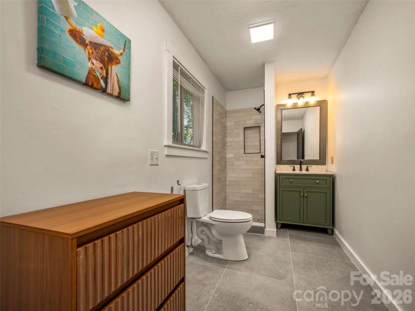 3276 Howard Gap Road, Hendersonville, NC 28792.  MLS# CAR4393443, YatesRealty ID 31087. Main level bathroom