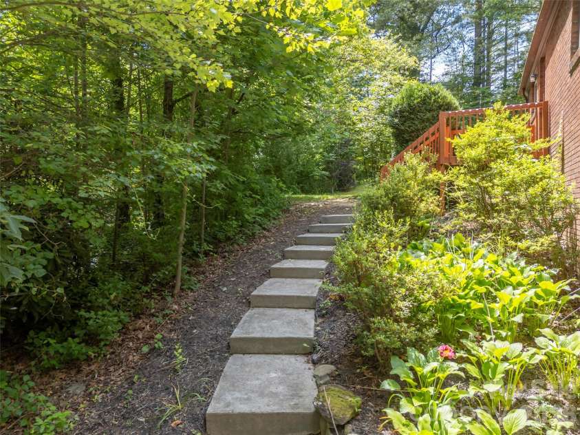 3276 Howard Gap Road, Hendersonville, NC 28792.  MLS# CAR4393443, YatesRealty ID 31087. Path to front door