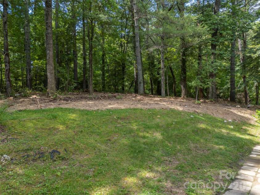 3276 Howard Gap Road, Hendersonville, NC 28792.  MLS# CAR4393443, YatesRealty ID 31087. Potential firepit setting