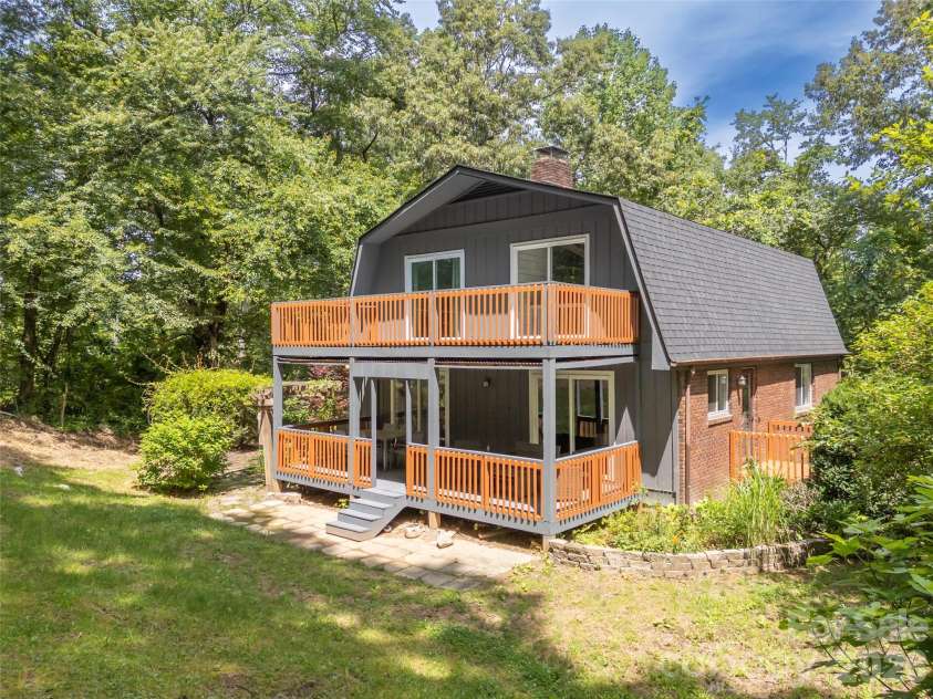 3276 Howard Gap Road, Hendersonville, NC 28792.  MLS# CAR4393443, YatesRealty ID 31087. Private back decks overlooking your yard