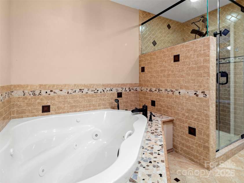 24 Ballantree Drive, Asheville, NC 28803.  MLS# CAR4289014, YatesRealty ID 31089. Primary Bath has heated floors