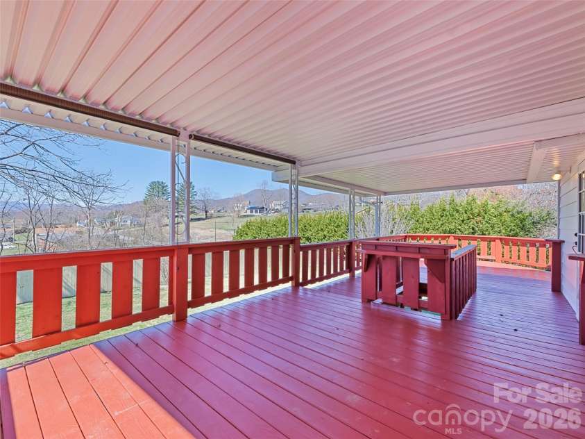 157 Morgan Street, Canton, NC 28716.  MLS# CAR4354334, YatesRealty ID 31093. Covered deck accessible from the kitchen
