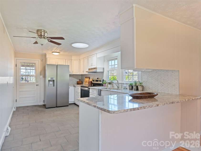 157 Morgan Street, Canton, NC 28716.  MLS# CAR4354334, YatesRealty ID 31093. Great connection between kitchen & dining