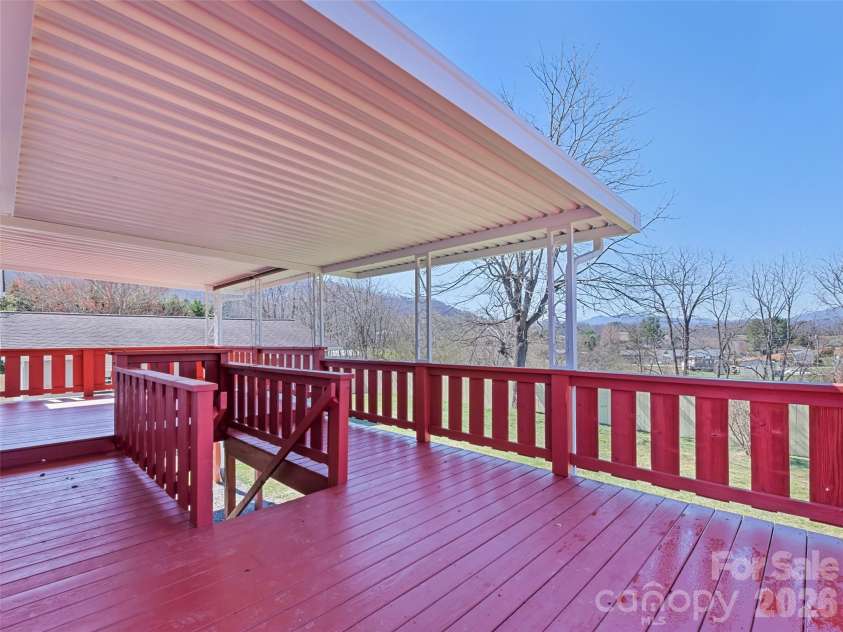 157 Morgan Street, Canton, NC 28716.  MLS# CAR4354334, YatesRealty ID 31093. Large partially covered back deck
