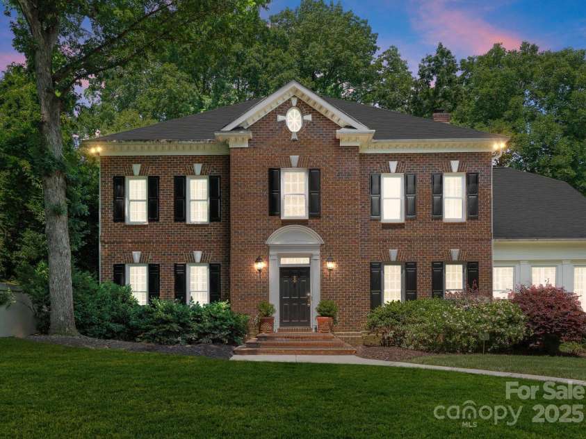 4301 Fairview Oaks Drive, Charlotte, NC 28211.  MLS# CAR4170796, YatesRealty ID 31096. Front Twilight
