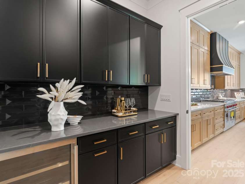 2007 Kendall Drive, Wesley Chapel, NC 28173.  MLS# CAR4207149, YatesRealty ID 31097. Scullery w/Bev Fridge, Sink & Dishwasher