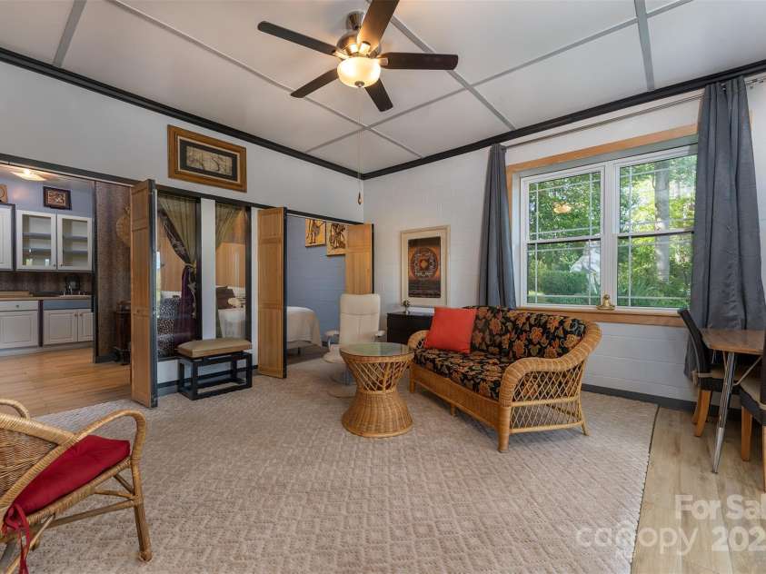 18 Timber Moss Drive, Asheville, NC 28804.  MLS# CAR4299629, YatesRealty ID 31099. Lower level apartment with separate entrance and parking.