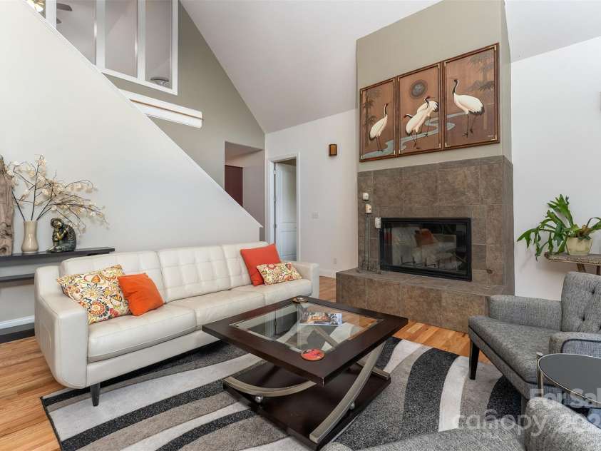 18 Timber Moss Drive, Asheville, NC 28804.  MLS# CAR4299629, YatesRealty ID 31099. Main level living with loft area above