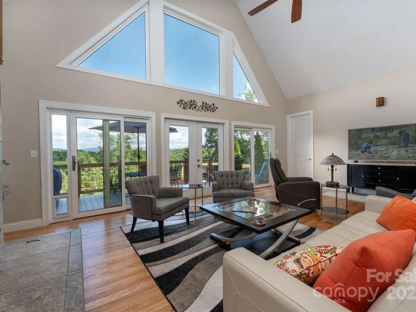 18 Timber Moss Drive, Asheville, NC 28804.  MLS# CAR4299629, YatesRealty ID 31099. Natural light with access to deck