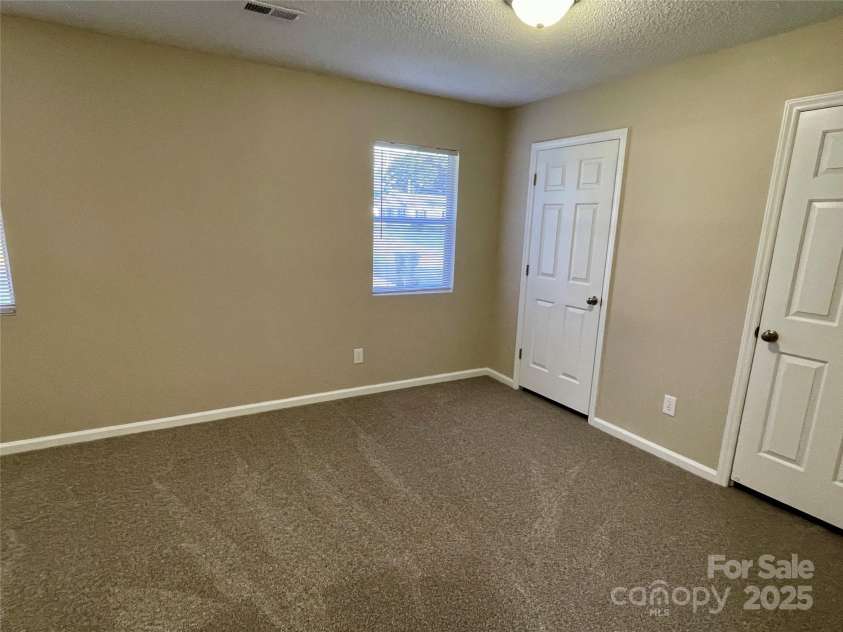 400 Lucy Avenue, Concord, NC 28027.  MLS# CAR4280783, YatesRealty ID 31101. 2nd bedroom w/2 closets