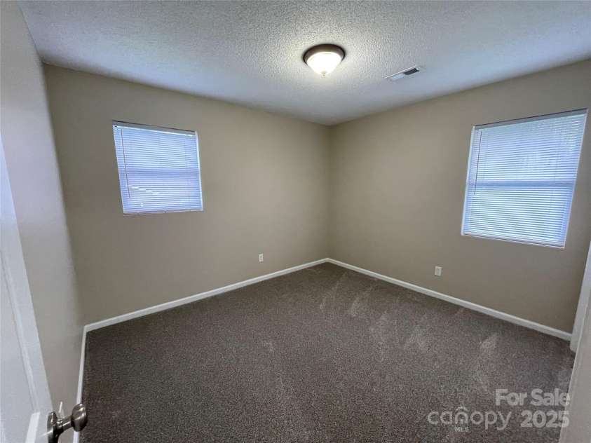 400 Lucy Avenue, Concord, NC 28027.  MLS# CAR4280783, YatesRealty ID 31101. 3rd bedroom