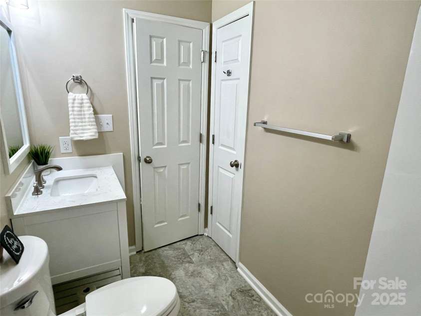 400 Lucy Avenue, Concord, NC 28027.  MLS# CAR4280783, YatesRealty ID 31101. Hall bathroom