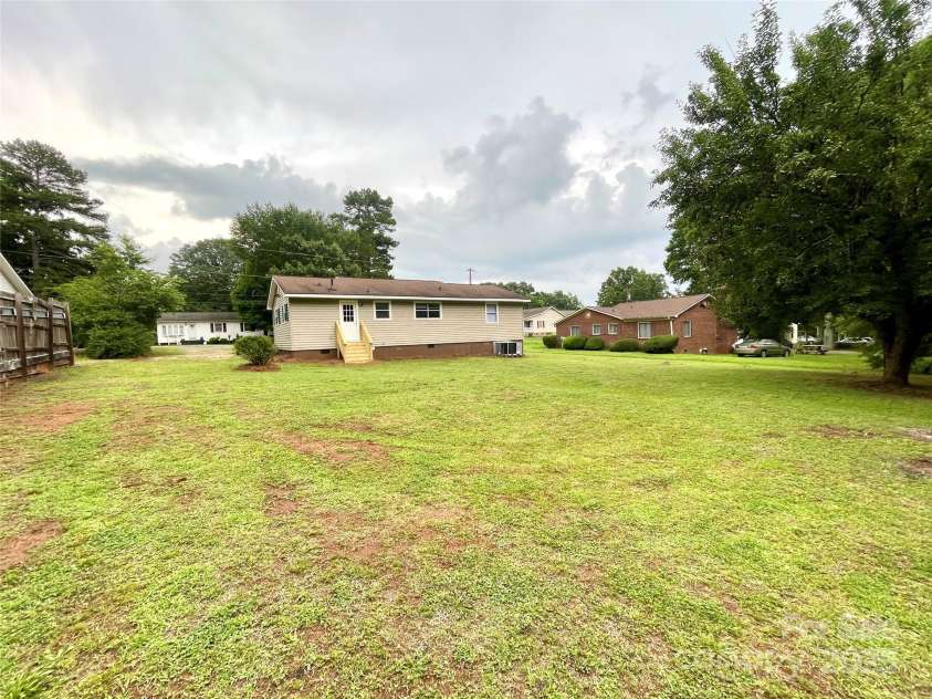 400 Lucy Avenue, Concord, NC 28027.  MLS# CAR4280783, YatesRealty ID 31101. Large flat backyard