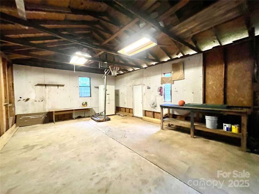 400 Lucy Avenue, Concord, NC 28027.  MLS# CAR4280783, YatesRealty ID 31101. Large space for workshop, hobbies, storage, etc