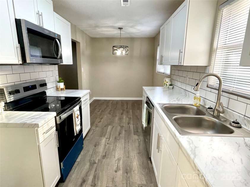 400 Lucy Avenue, Concord, NC 28027.  MLS# CAR4280783, YatesRealty ID 31101. New sink & faucet