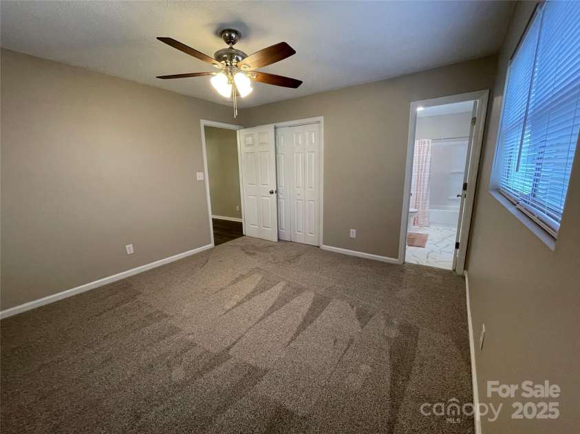 400 Lucy Avenue, Concord, NC 28027.  MLS# CAR4280783, YatesRealty ID 31101. Primary BR looking into primary bathroom