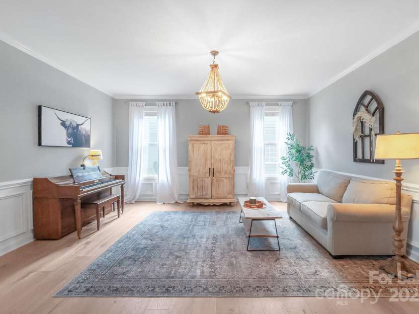 1002 Sudbury Lane, Matthews, NC 28104.  MLS# CAR4285222, YatesRealty ID 31102. Living room or dining room