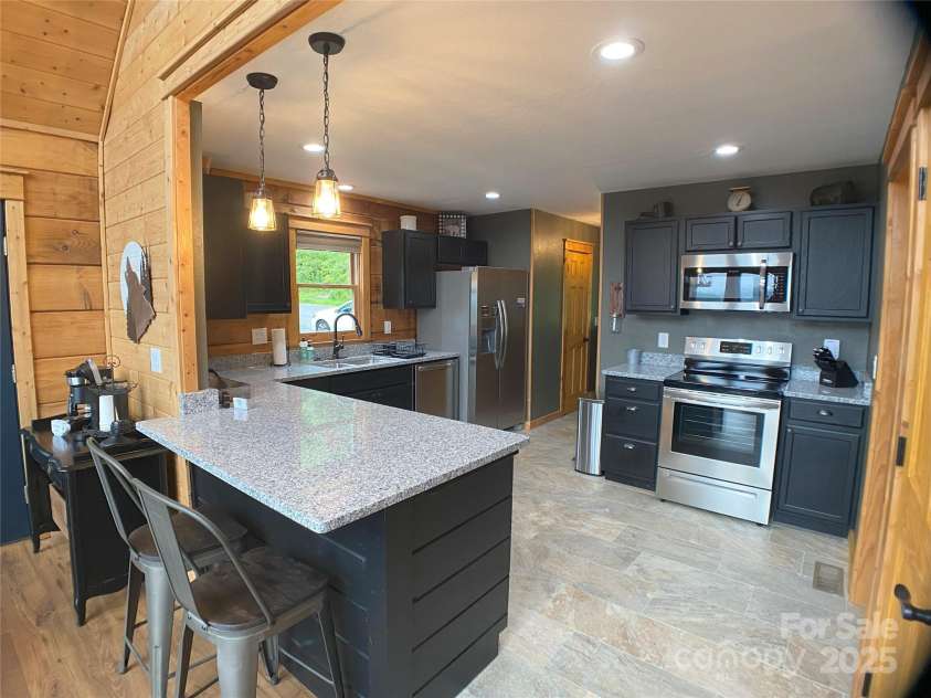 151 Scenic Wolf Drive, Mars Hill, NC 28754.  MLS# CAR4278406, YatesRealty ID 31105. 