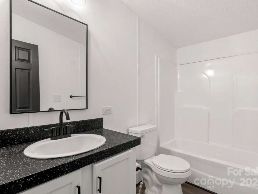 5810 NC Highway 66 Highway, King, NC 27021.  MLS# CAR4287311, YatesRealty ID 31106. 2nd full bath