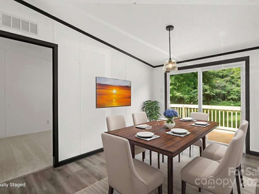 5810 NC Highway 66 Highway, King, NC 27021.  MLS# CAR4287311, YatesRealty ID 31106. Dining room