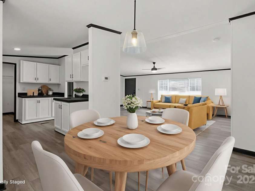 5810 NC Highway 66 Highway, King, NC 27021.  MLS# CAR4287311, YatesRealty ID 31106. Dining room virtually staged for inspiration