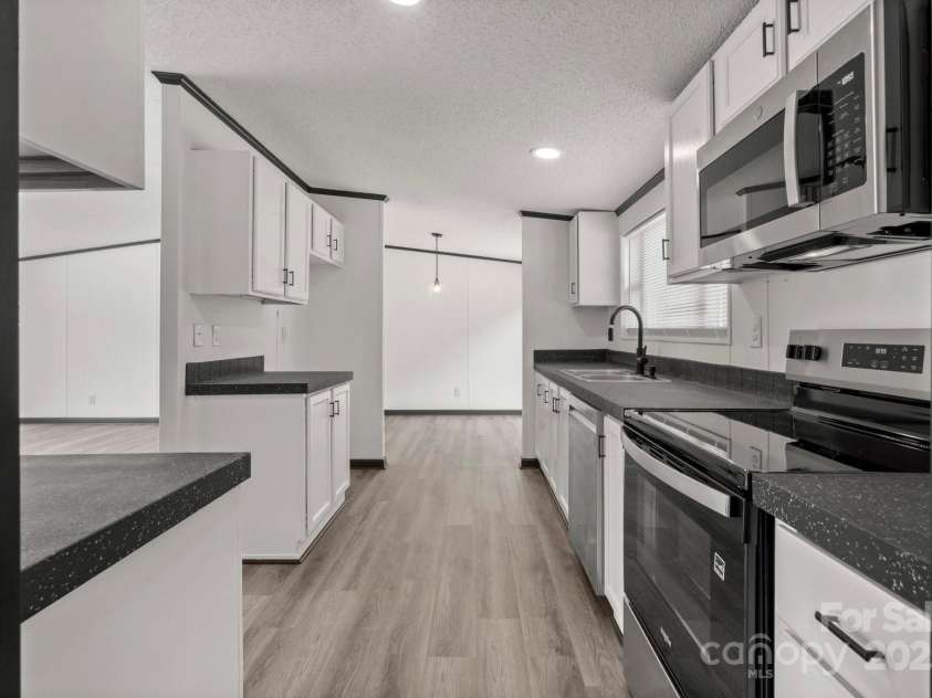 5810 NC Highway 66 Highway, King, NC 27021.  MLS# CAR4287311, YatesRealty ID 31106. Kitchen