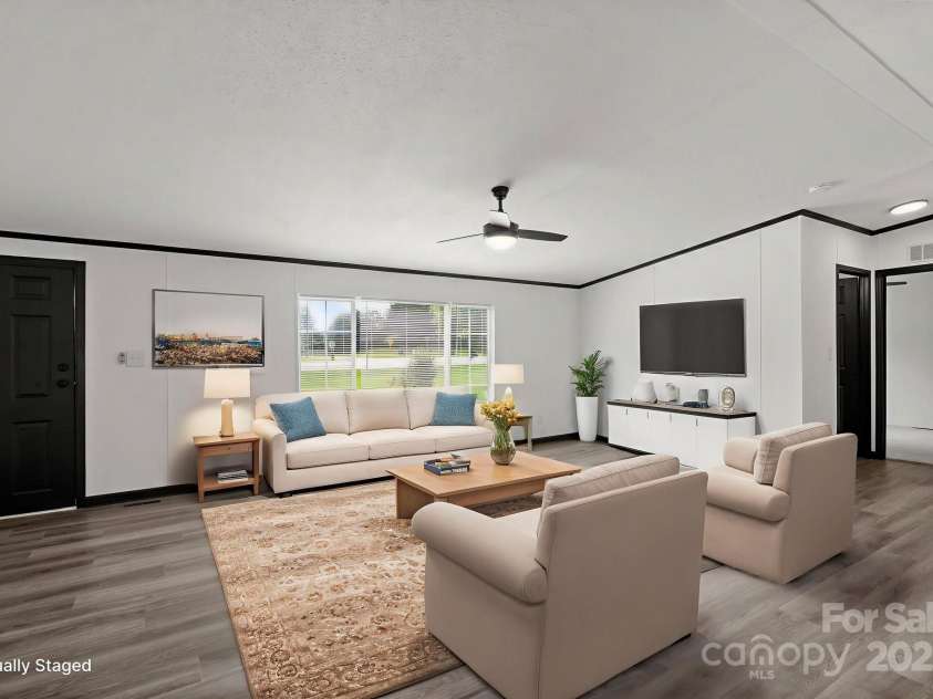 5810 NC Highway 66 Highway, King, NC 27021.  MLS# CAR4287311, YatesRealty ID 31106. Living room Virtually staged for inspiration
