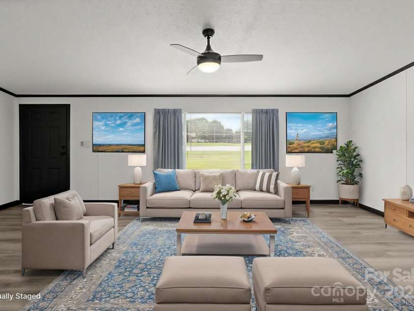 5810 NC Highway 66 Highway, King, NC 27021.  MLS# CAR4287311, YatesRealty ID 31106. Living room virtually staged for inspiration