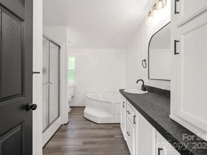 5810 NC Highway 66 Highway, King, NC 27021.  MLS# CAR4287311, YatesRealty ID 31106. Primary bathroom