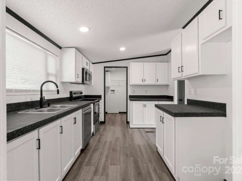 5810 NC Highway 66 Highway, King, NC 27021.  MLS# CAR4287311, YatesRealty ID 31106. Refreshed kitchen