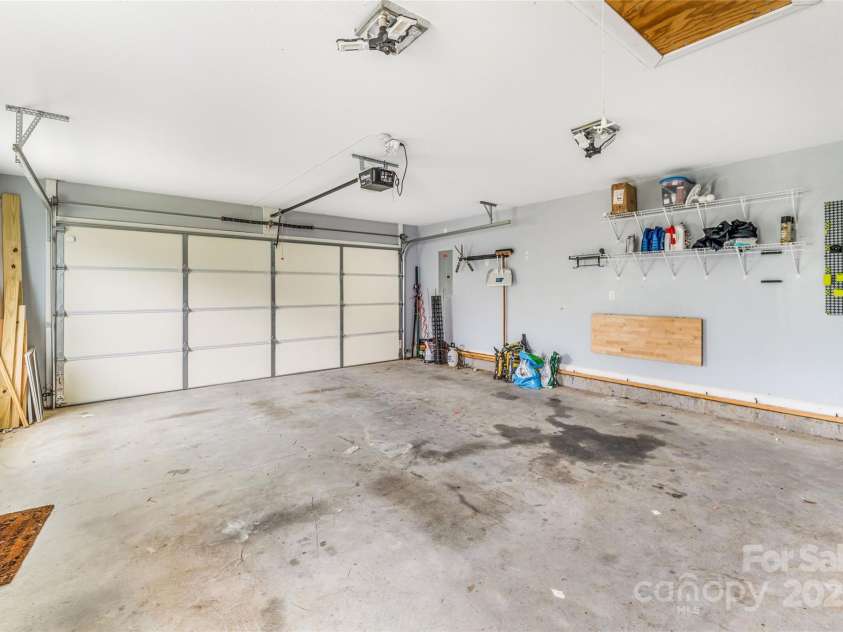 45 Heather Mist Drive, Weaverville, NC 28787.  MLS# CAR4282171, YatesRealty ID 31108. 2 car garage with pull down access to above garage attic storage