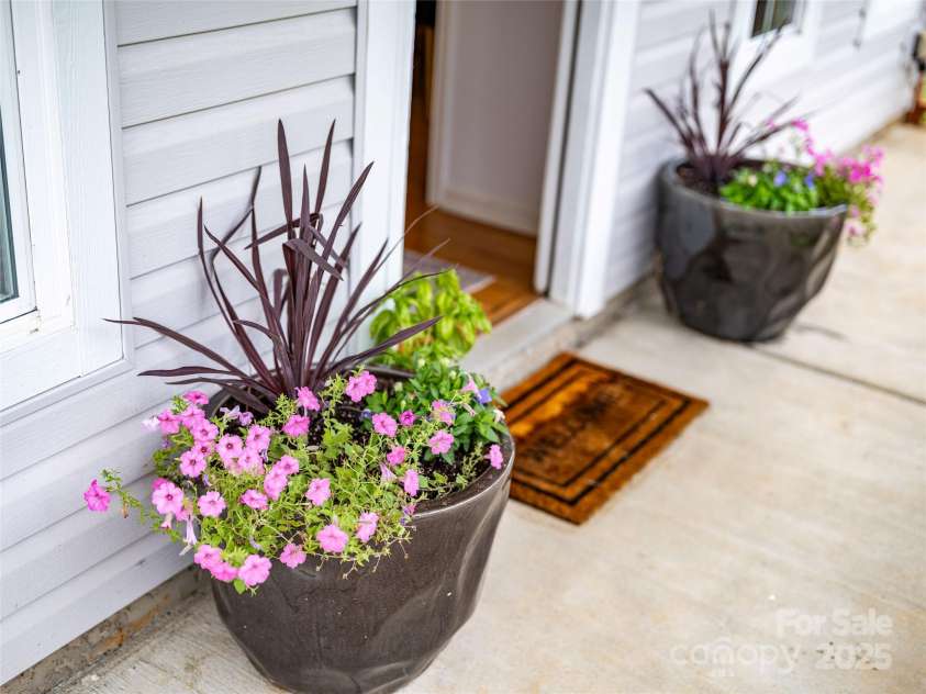 45 Heather Mist Drive, Weaverville, NC 28787.  MLS# CAR4282171, YatesRealty ID 31108. Covered front porch welcomes you in