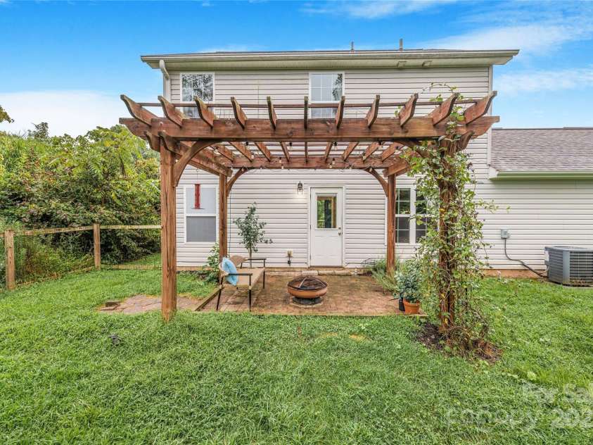 45 Heather Mist Drive, Weaverville, NC 28787.  MLS# CAR4282171, YatesRealty ID 31108. Pergola for shade