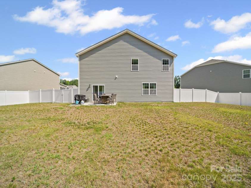 404 Saddlebred Lane, Locust, NC 28097.  MLS# CAR4275640, YatesRealty ID 31109. .32 Acres on premioum lot