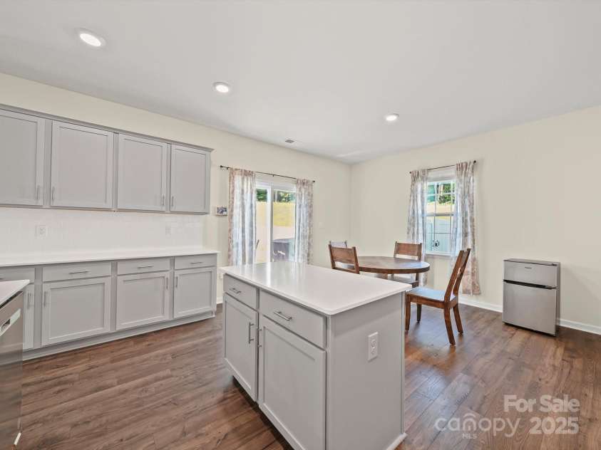 404 Saddlebred Lane, Locust, NC 28097.  MLS# CAR4275640, YatesRealty ID 31109. Kitchen with Island