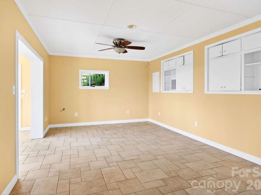 38 Lookout Road, Asheville, NC 28804.  MLS# CAR4387635, YatesRealty ID 31110. Lowest Below Grade level