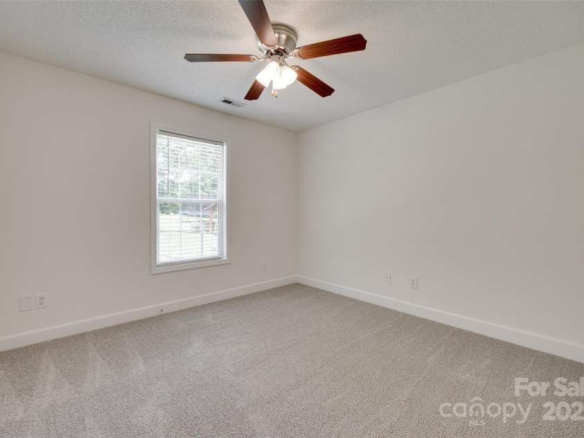 605 Summey Farm Drive, Dallas, NC 28034.  MLS# CAR4249509, YatesRealty ID 31112. Back Secondary Bedroom