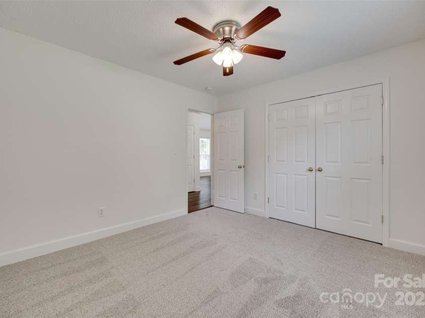 605 Summey Farm Drive, Dallas, NC 28034.  MLS# CAR4249509, YatesRealty ID 31112. Back Secondary Bedroom