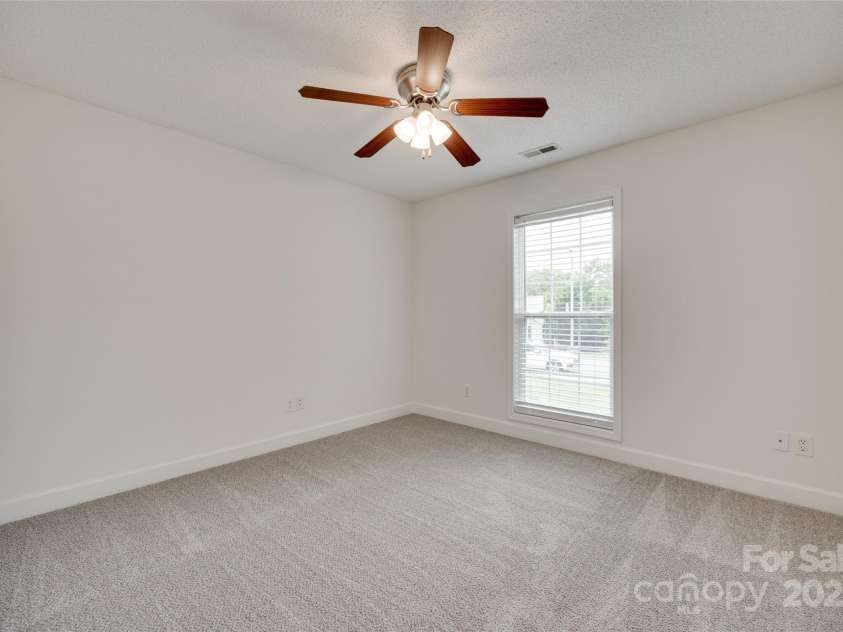 605 Summey Farm Drive, Dallas, NC 28034.  MLS# CAR4249509, YatesRealty ID 31112. Front Secondary Bedroom