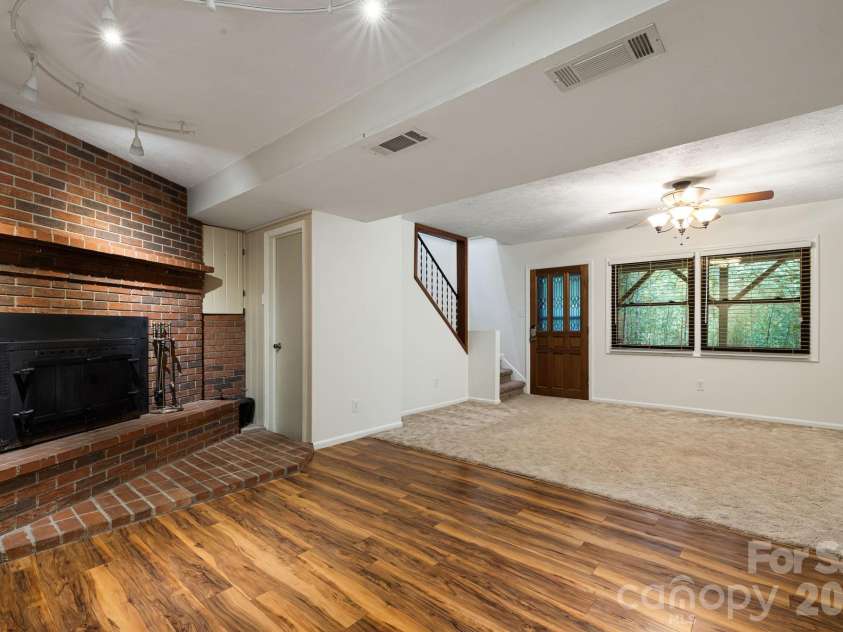 10 Botany View Court, Asheville, NC 28805.  MLS# CAR4394673, YatesRealty ID 31113. Lower Level Den.