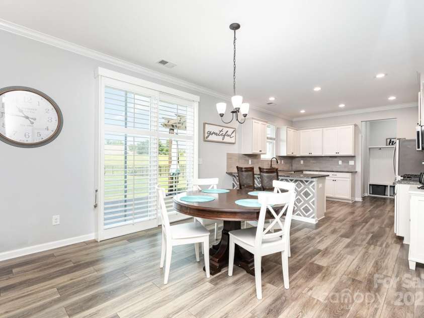 7414 Meridale Forest Drive, Charlotte, NC 28269.  MLS# CAR4264333, YatesRealty ID 31114. Great Room Opens up to Kitchen