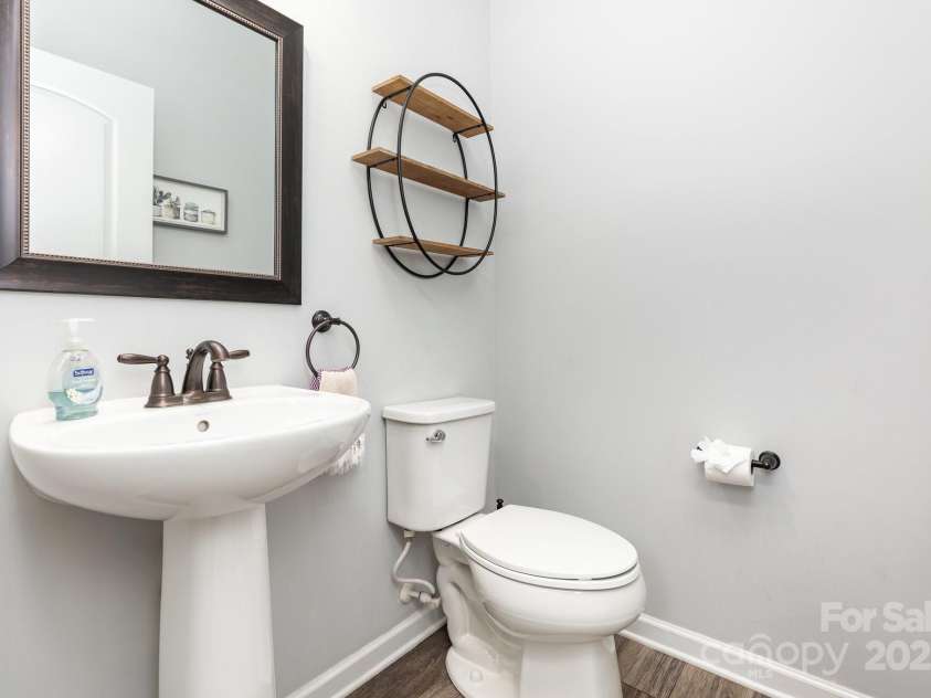 7414 Meridale Forest Drive, Charlotte, NC 28269.  MLS# CAR4264333, YatesRealty ID 31114. Main Floor Powder Room