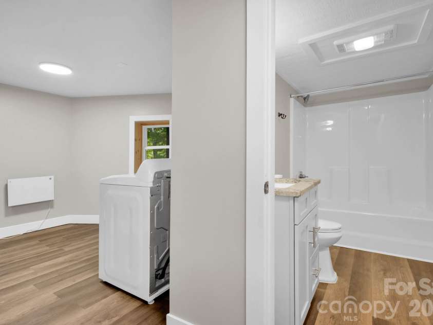 119 Beechwood Lane, Beech Mountain, NC 28604.  MLS# CAR4412496, YatesRealty ID 31115. Downstairs Laundry and Full Bathroom