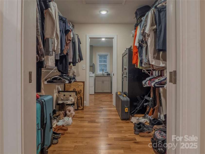 140 Bald Rock Road, Hendersonville, NC 28792.  MLS# CAR4284431, YatesRealty ID 31119. Large walk in closet has access from primary bedroom and laundry room