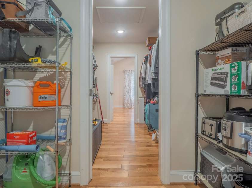 140 Bald Rock Road, Hendersonville, NC 28792.  MLS# CAR4284431, YatesRealty ID 31119. Plenty of pantry storage in laundry off of the kitchen