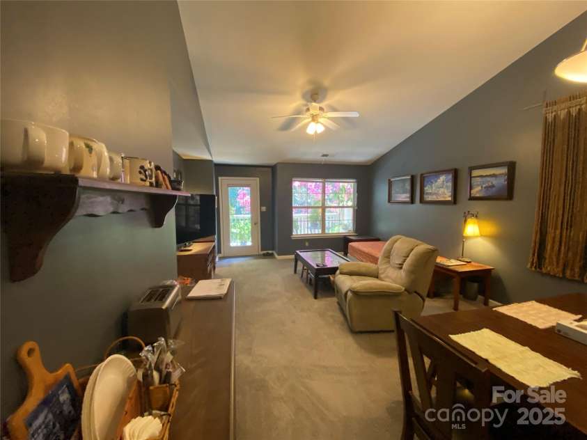 7224 Michaels Landing Drive, Charlotte, NC 28262.  MLS# CAR4283823, YatesRealty ID 31120. Famly room opens to Dining area