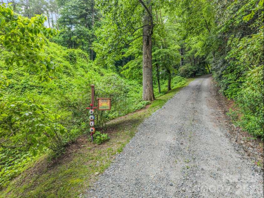 2212 Green River Road, Zirconia, NC 28790.  MLS# CAR4389873, YatesRealty ID 31122. 
